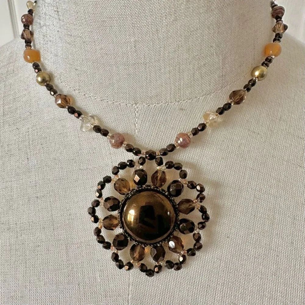 Brown and yellow beaded pendant necklace